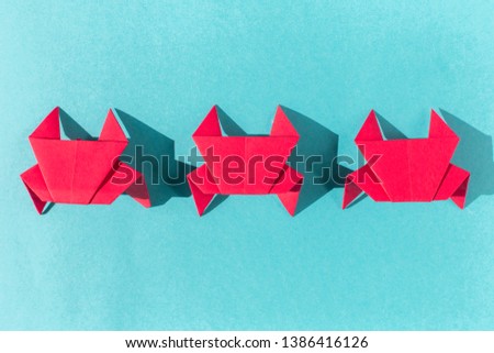 three red crab blue on background paper, Paper handicraft and paper art