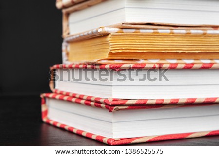 paperback books on a table