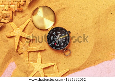 beautiful sea composition with shells and vintage compass