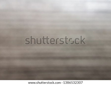 Blurry glitter gray and brow wall for decorate luxury background, bokeh abstract image