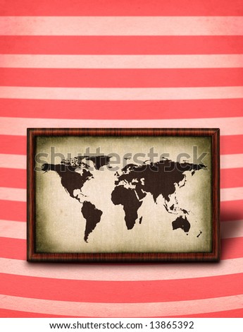 world map in a wooden frame on striped background