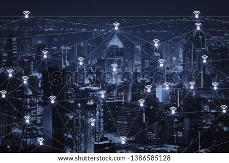 The abstract image of wireless network and wifi connection technology concept with bangkok city background at night in Thailand