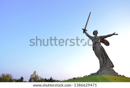 
Motherland statue on Mamayev Kurgan in Russia, Volgograd city on the background of clear blue sky. Victory Day over fascism May 9th. Royalty-Free Stock Photo #1386629471