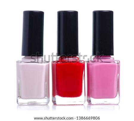 Different color nail polish on a white background. Isolation