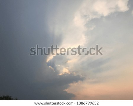 The sky in the spring. White clouds on a blue sky.Blue sky white cloudy with sunlight rays for background