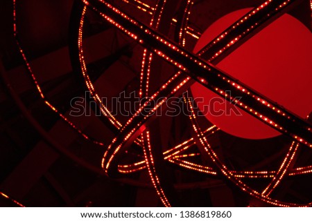 Graphic and artistic representation of an atom with LED lights