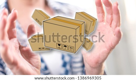 Packaging concept between hands of a woman in background