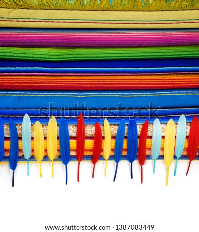 Colorful bright scarves. Ecuador. Colored textile.