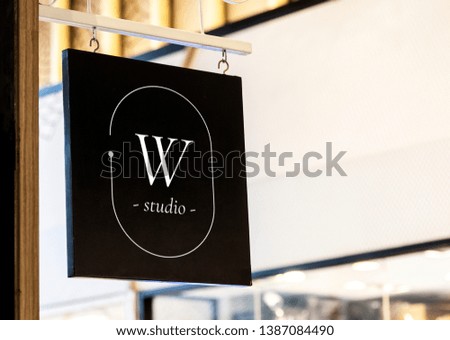 Hanging square black shop sign mockup