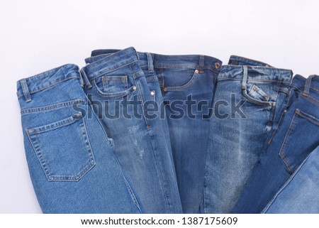 Six Blue jeans isolated closeup
