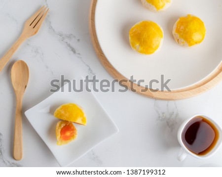 East asian afternoon tea food and drink Concept Flat lay mid-autumn festival ,Spring Roll pastry with nuts , salted eggs.