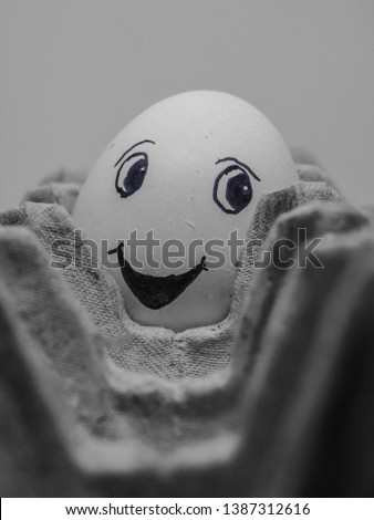 The happy egg in egg tray 