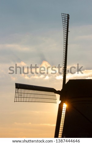 Windmill at Kinderdijk during sunset