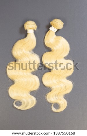 Beautiful body wave hair of blonde color