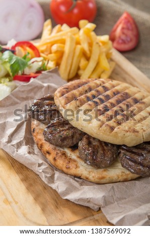 Turkish meat ball special bread background fries