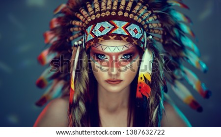 young girl in costume native American Indian background