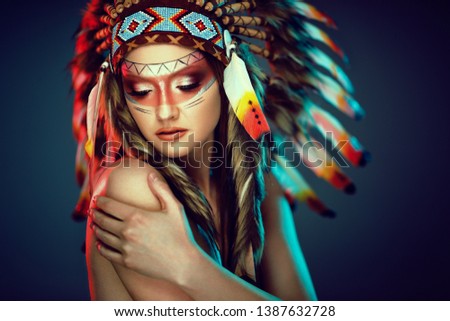 Feminine Indian woman with colorful feather hat