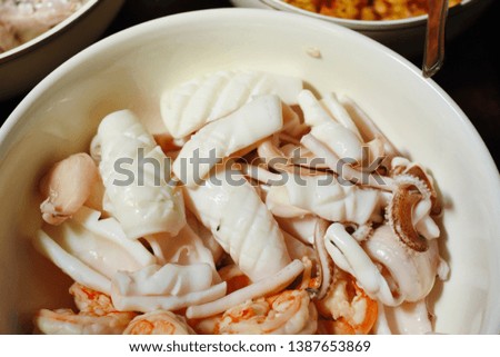 squid and shrim meat in boil rice