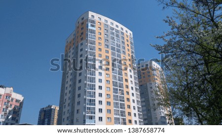 Apartment house under clear blue sky
