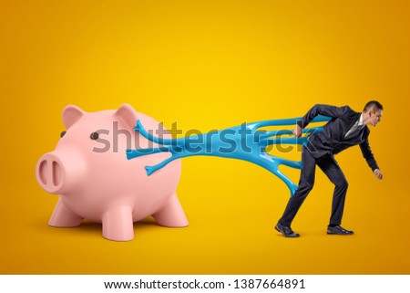 Young businessman stuck to pink piggy bank with blue sticky slime on yellow background. Digital art. People and objects. Money and finance.