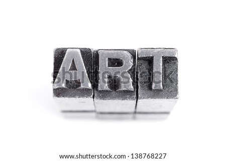 Art sign,  antique metal letter-press type isolated