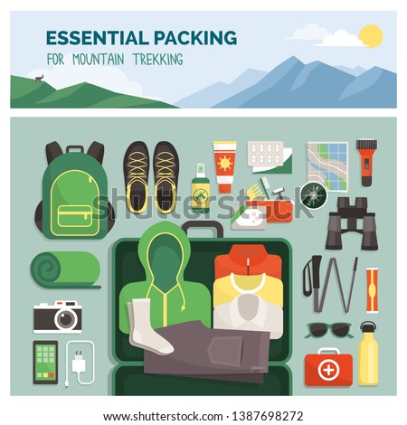 Essential packing for mountain trekking, outdoor travel and sport, clothes and accessories top view
