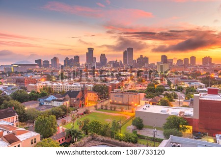 New Orleans, Louisiana, USA downtown city skyline at dawn. 