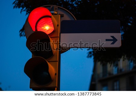 Traffic light on red with empty street sign for copy space