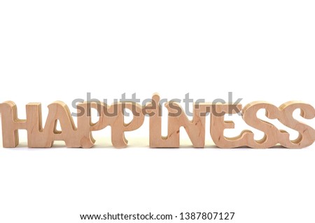 wooden word "happiness" on white background