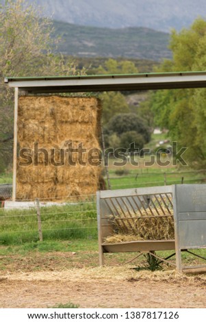 Farm scene with straw bales in Spain.