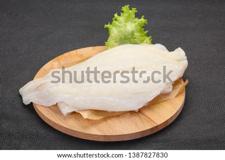 Raw halibut fillet ready for cooking