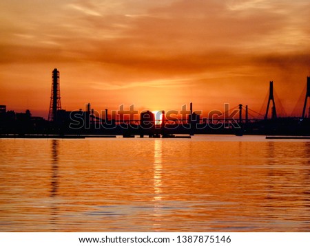 Sunrise over Yokohama Harbor near Tokyo, Japan. The picture was taken in early May.
