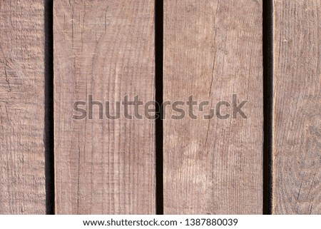 Photos of old smooth boards covered with sand, wood texture, background