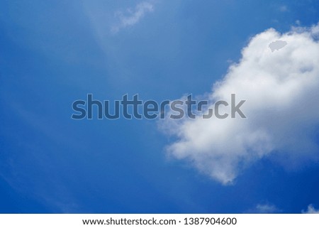 Big clouds on blue sky