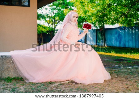 Muslim Bride over nature background
