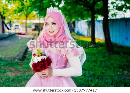 Muslim Bride over nature background