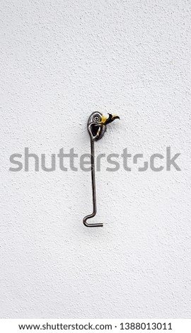 A single cabin hook on a wall