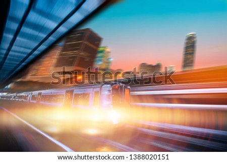 Motion blur of high speed train moving  on city
