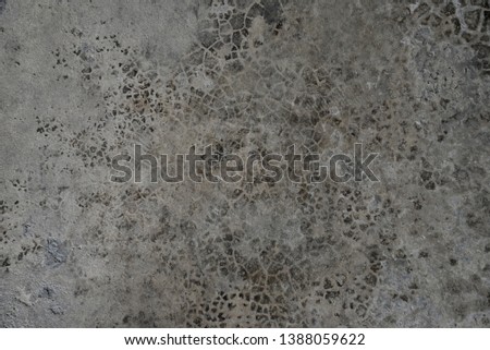 the old cement wall with stains