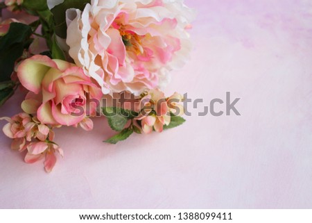 Pink flowers: rose, peony and Sakura on light pink background. Background for cards, greetings. Delicate, pastel colors.