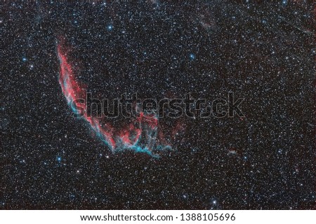 Photo of a cosmic nebula taken through a telescope. cosmic nebula NGC 6960. Space nebula between the stars. stars. space. cloud, dust, outer space.