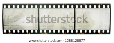 single scratched 35mm film or movie strip with three empty or blank film cells, just blend in your work to get that old film effect