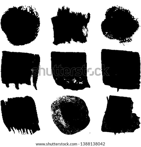 Collection of spots, brush strokes in grunge style. Monochrome abstract blots on white background