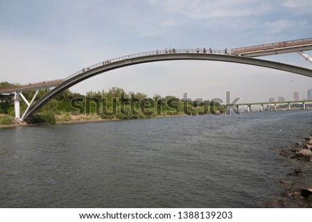 The people of Seoul City are walking on a bridge with fine weather. South Korea

