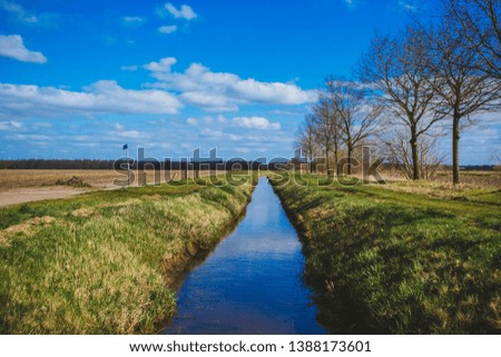 Canal in the Netherlands. Countryside. Bike Lane. Spring.