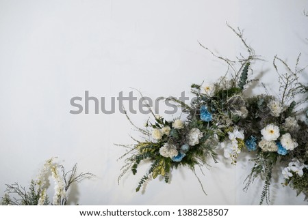 Many flowers are decorated on a white background. Prepared for a photo shoot in wedding