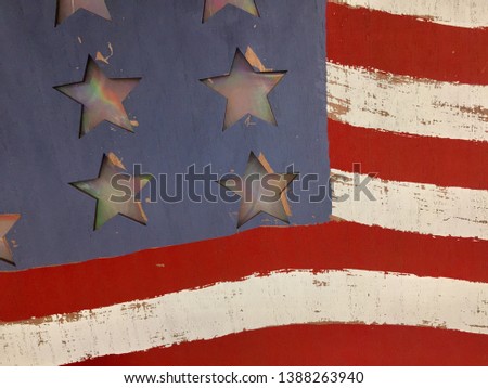 Closeup of an American flag painted on wood parts of 7stars pictured