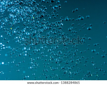 Blue water abstract splashes bokeh