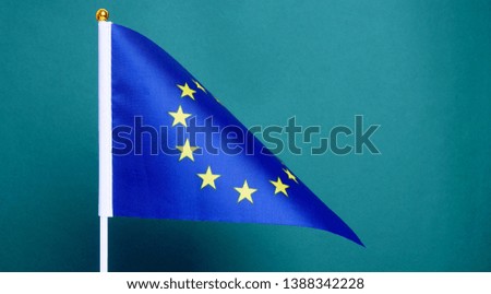 Flag of European Union isolated on green background.