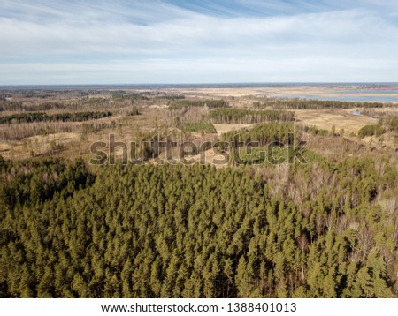 aerial view of countryside endless green forests with small lakes. evergreen spruce tree forest